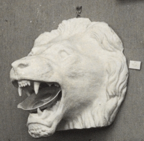 Untitled. Head of roaring lion with open mouth with a plate of fried eggs in its mouth 